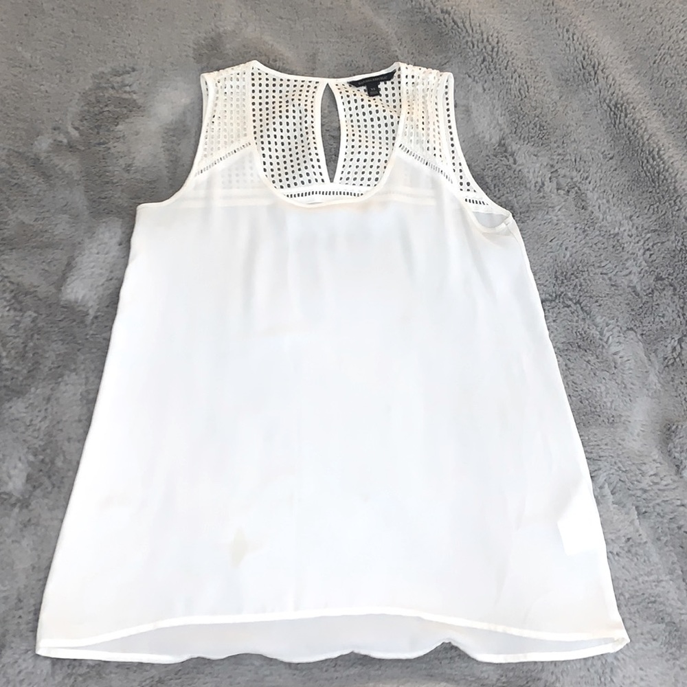 White silky top with eyelet straps